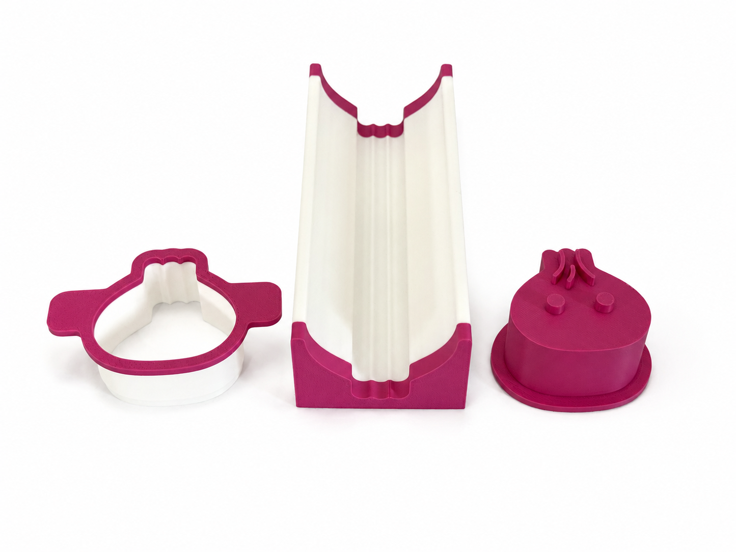 Ivory white and pink dumpling cake pop mold set with matching cutter, press tool and 6 inch tray on a white background.