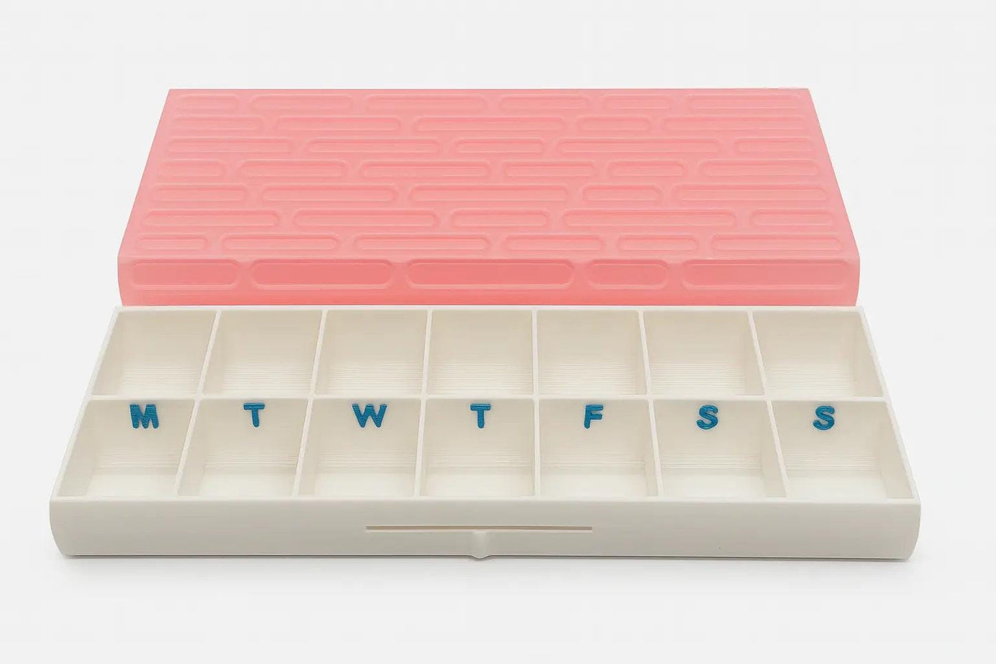 Brick texture duo pill case for twice-daily medication organization.
