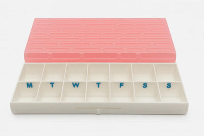 Brick texture duo pill case for twice-daily medication organization.