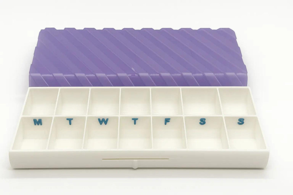 Ridge texture duo pill case for twice-daily medication organization.