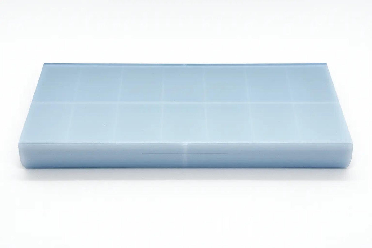 Smooth texture duo pill case for twice-daily medication organization.