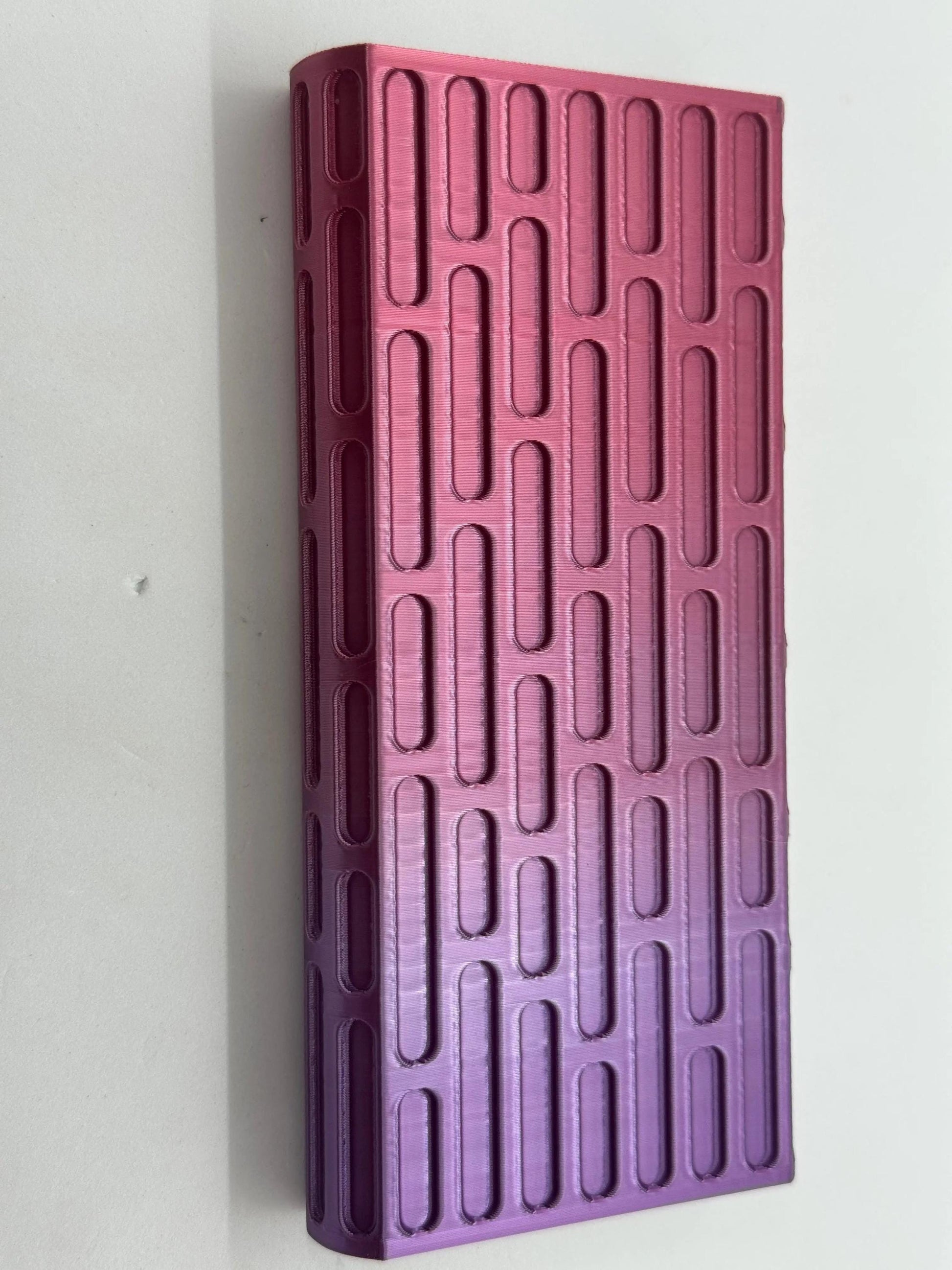 Brick texture duo pill case for twice-daily medication organization.