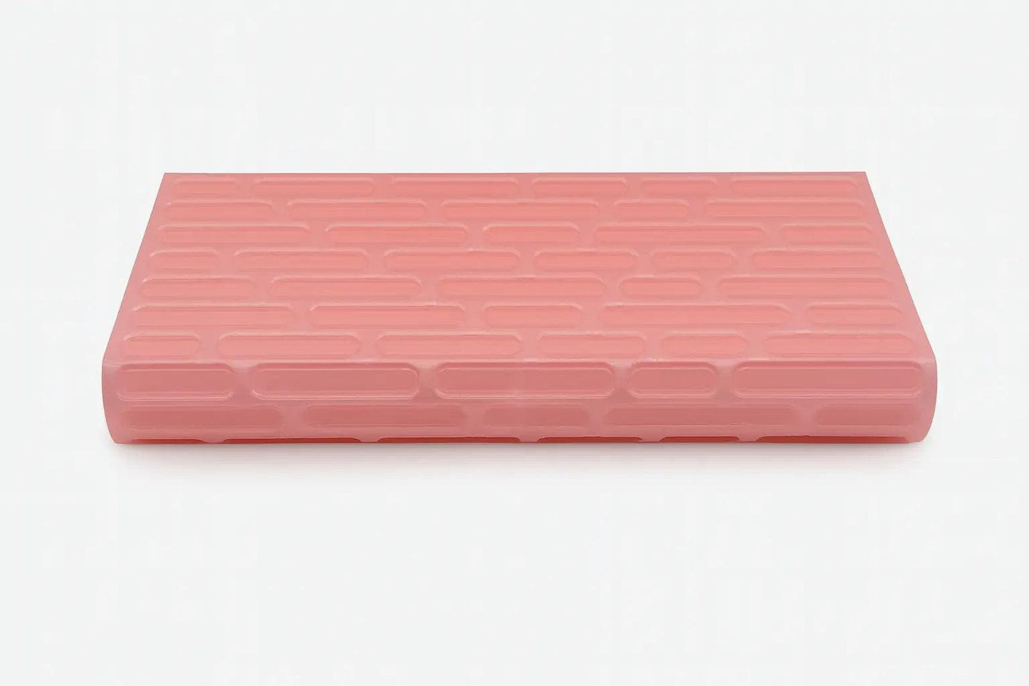 Brick texture duo pill case for twice-daily medication organization.