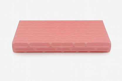 Brick texture duo pill case for twice-daily medication organization.