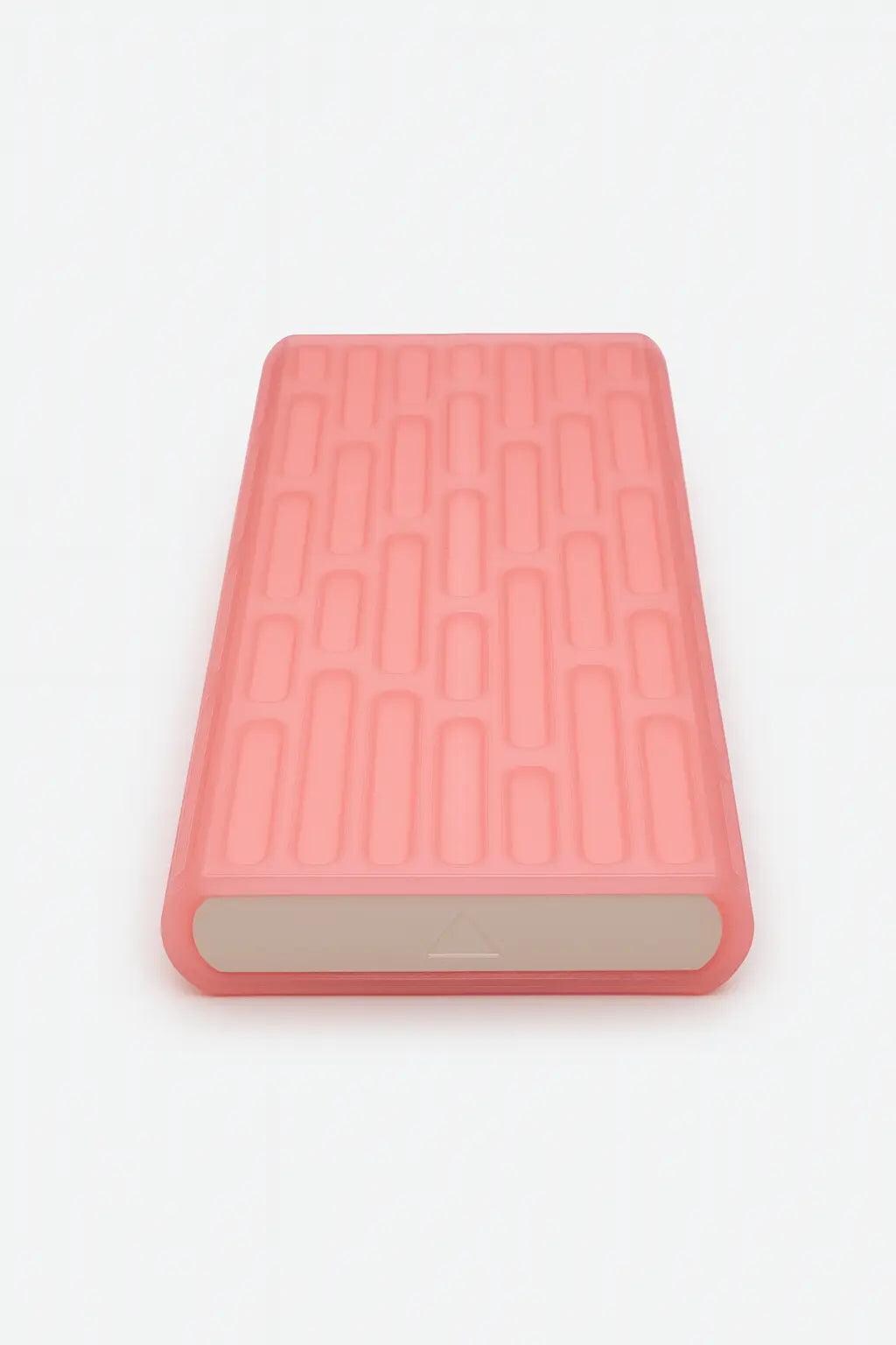 Brick texture duo pill case for twice-daily medication organization.