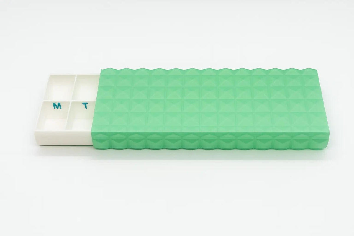 Diamond texture duo pill case for twice-daily medication organization.