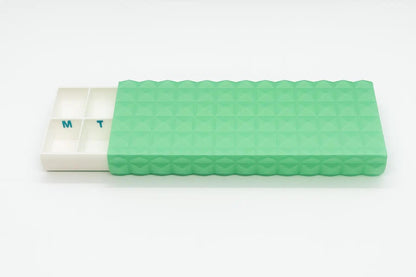 Diamond texture duo pill case for twice-daily medication organization.