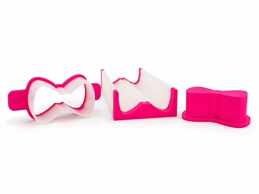Bow cake pop mold set components with matching mold, press tool, cutter, and 6-inch tray.